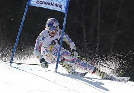Lindsey Vonn of the U.S. clears a gate during the women's alpine skiing giant slalom race at the World Cup finals in Schladming March 18, 20 Lindsey Vonn of the U.S. clears a gate during the women's alpine skiing giant slalom race at the World Cup finals in Schladming March 18, 20
