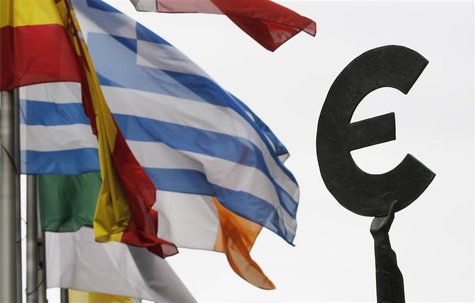Greek and others European national flags flutter near an euro symbol outside the EU Parliament in Brussels August 30, 2011. REUTERS/Francois Greek and others European national flags flutter near an euro symbol outside the EU Parliament in Brussels August 30, 2011. REUTERS/Francois