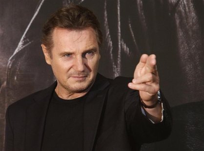 Actor Liam Neeson poses before a news conference to promote his movie, "Taken 2" in Seoul September 17, 2012. REUTERS/Kim Hong-Ji (SOUTH KOR Actor Liam Neeson poses before a news conference to promote his movie, "Taken 2" in Seoul September 17, 2012. REUTERS/Kim Hong-Ji (SOUTH KOR