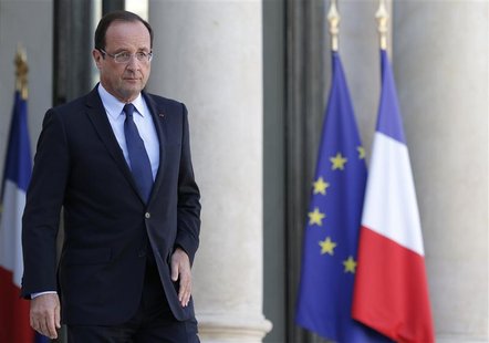 French President Francois Hollande arrives for a statement on the steps of the Elysee Palace, after a meeting with the heads of France's Jew French President Francois Hollande arrives for a statement on the steps of the Elysee Palace, after a meeting with the heads of France's Jew
