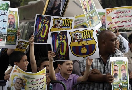 Palestinians protest against the presence of former Israeli captive soldier Gilad Shalit at the upcoming Spanish first division soccer match Palestinians protest against the presence of former Israeli captive soldier Gilad Shalit at the upcoming Spanish first division soccer match