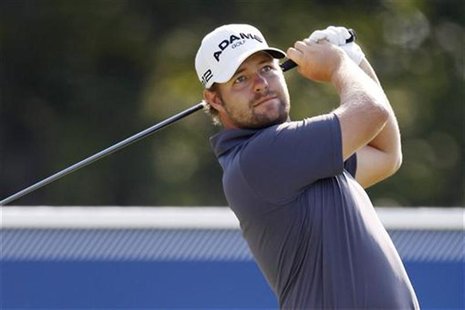 Ryan Moore of the U.S. tees off at the 17th hole during the second round of the Deutsche Bank Championship golf tournament in Norton, Massac Ryan Moore of the U.S. tees off at the 17th hole during the second round of the Deutsche Bank Championship golf tournament in Norton, Massac