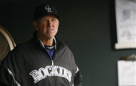 Colorado Rockies manager Jim Tracy reacts in the dugout after the Rockies pitched their seventh walk against the New York Mets in the fifth Colorado Rockies manager Jim Tracy reacts in the dugout after the Rockies pitched their seventh walk against the New York Mets in the fifth