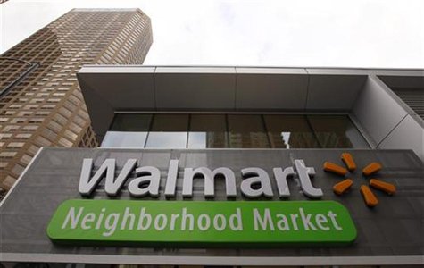 A Walmart Neighborhood Market sign is seen outside a newly opened store in Chicago September 21, 2011. The 27,000 square-foot store is the f A Walmart Neighborhood Market sign is seen outside a newly opened store in Chicago September 21, 2011. The 27,000 square-foot store is the f