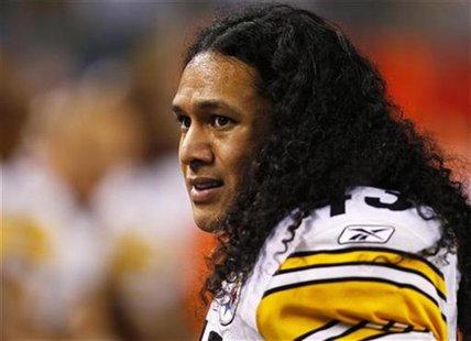 Pittsburgh Steelers safety Troy Polamalu watches from the sidelines during the first half against the Green Bay Packers in the NFL's Super B Pittsburgh Steelers safety Troy Polamalu watches from the sidelines during the first half against the Green Bay Packers in the NFL's Super B