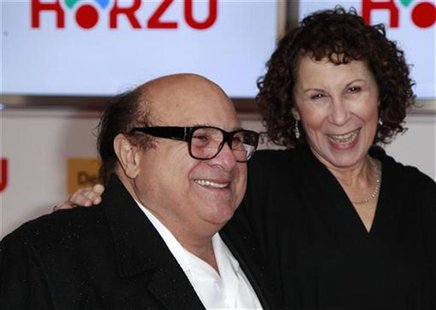 U.S.actor Danny Devito (L) and his wife U.S. actress Rhea Perlman arrive on the red carpet for the 46th 'Goldene Kamera' (Golden Camera) awa U.S.actor Danny Devito (L) and his wife U.S. actress Rhea Perlman arrive on the red carpet for the 46th 'Goldene Kamera' (Golden Camera) awa
