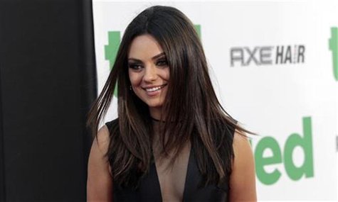 Cast member Mila Kunis poses at the premiere of "Ted" at the Grauman's Chinese theatre in Hollywood, California June 21, 2012. The movie ope Cast member Mila Kunis poses at the premiere of "Ted" at the Grauman's Chinese theatre in Hollywood, California June 21, 2012. The movie ope