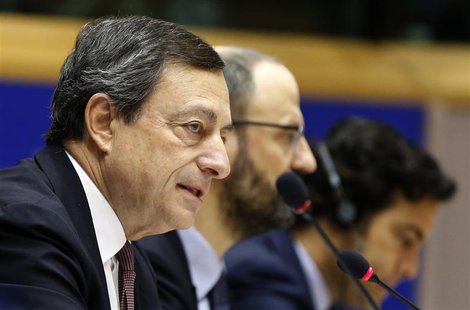 European Central Bank (ECB) President Mario Draghi (L) speaks during the European Parliament's Economic and Monetary Affairs Committee in Br European Central Bank (ECB) President Mario Draghi (L) speaks during the European Parliament's Economic and Monetary Affairs Committee in Br