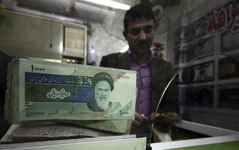Iranian rial banknotes are seen at a currency exchange shop in Kerbala, 110 km (70 miles) south of Baghdad January 27, 2012. REUTERS/Mushtaq Iranian rial banknotes are seen at a currency exchange shop in Kerbala, 110 km (70 miles) south of Baghdad January 27, 2012. REUTERS/Mushtaq