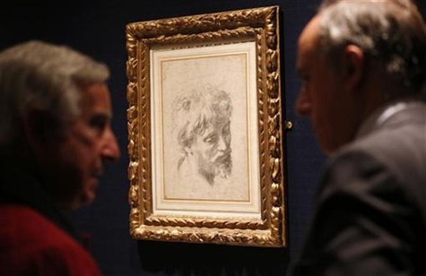 Visitors look at Raphael's "Auxiliary cartoon for the Head of a Young Apostle from 1519-1520 which has an estimated value of £10 to £15 mill Visitors look at Raphael's "Auxiliary cartoon for the Head of a Young Apostle from 1519-1520 which has an estimated value of £10 to £15 mill