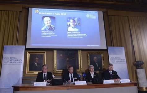 Pictures of the 2012 Nobel Prize for Physics laureates Serge Haroche (L) of France and David Wineland of the U.S. are displayed on a screen Pictures of the 2012 Nobel Prize for Physics laureates Serge Haroche (L) of France and David Wineland of the U.S. are displayed on a screen