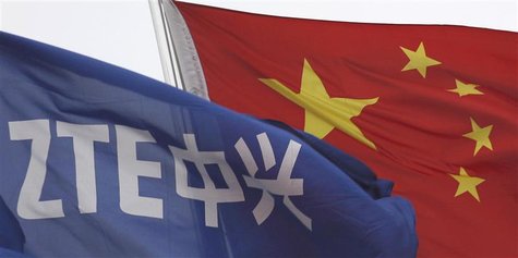 A ZTE flag flutters in front of the Chinese national flag outside its headquarters in Shenzhen, Guangdong province in this April 17, 2012 fi A ZTE flag flutters in front of the Chinese national flag outside its headquarters in Shenzhen, Guangdong province in this April 17, 2012 fi