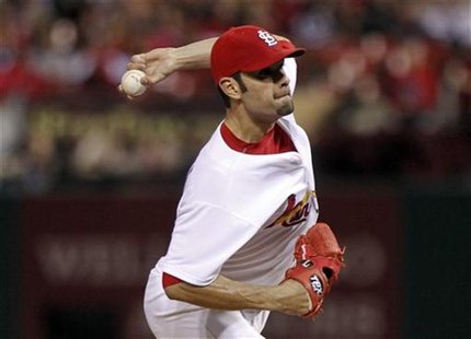 St. Louis Cardinals starting pitcher Jaime Garcia delivers a pitch to a Cincinnati Reds batter during the first inning of their MLB National St. Louis Cardinals starting pitcher Jaime Garcia delivers a pitch to a Cincinnati Reds batter during the first inning of their MLB National