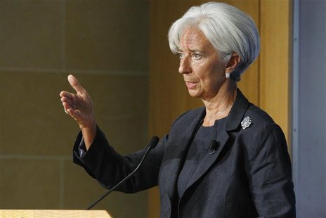 International Monetary Fund Managing Director Christine Lagarde gestures during her remarks on the state of the world economy at the Peterso International Monetary Fund Managing Director Christine Lagarde gestures during her remarks on the state of the world economy at the Peterso