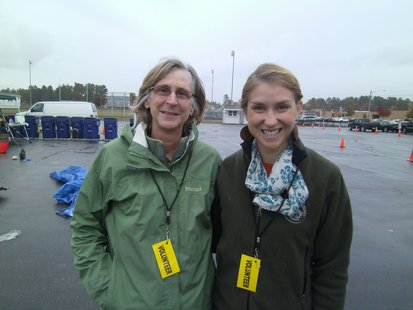 DNR representatives Cynthia Moore (left) and Anna McCabe (right) who joined the effort to sort recyclables from garbage during a Mosinee demonstration 10/9/12