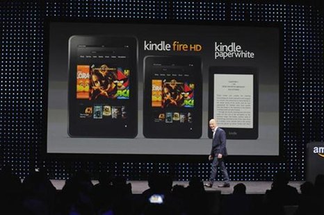 Amazon CEO Jeff Bezos walks off after unveiling the Kindle Paperwhite, Kendle Fire HD 8.9" and 7" during Amazon's Kindle Fire event in Santa Amazon CEO Jeff Bezos walks off after unveiling the Kindle Paperwhite, Kendle Fire HD 8.9" and 7" during Amazon's Kindle Fire event in Santa