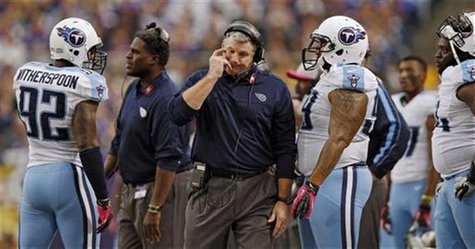 Tennessee Titans head coach Mike Munchak walks on the sidelines after Tennessee cornerback Coty Sensabaugh is called for an unnecessary roug Tennessee Titans head coach Mike Munchak walks on the sidelines after Tennessee cornerback Coty Sensabaugh is called for an unnecessary roug