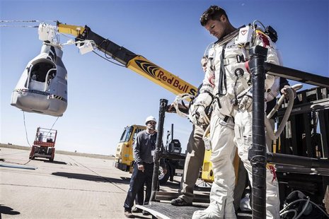 Pilot Felix Baumgartner of Austria leaves his capsule after his mission was aborted due to high winds in Roswell, New Mexico, in this Octobe Pilot Felix Baumgartner of Austria leaves his capsule after his mission was aborted due to high winds in Roswell, New Mexico, in this Octobe