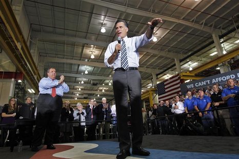 Republican presidential nominee Mitt Romney speaks as New Jersey Governor Chris Christie (L) claps during a town hall campaign stop at Ariel Republican presidential nominee Mitt Romney speaks as New Jersey Governor Chris Christie (L) claps during a town hall campaign stop at Ariel