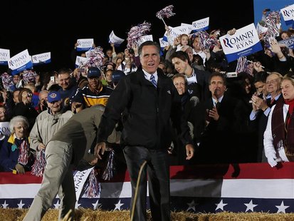 Republican presidential nominee Mitt Romney smiles as he arrives at a campaign rally outside the Cuyahoga Falls Natatorium in Cuyahoga Falls Republican presidential nominee Mitt Romney smiles as he arrives at a campaign rally outside the Cuyahoga Falls Natatorium in Cuyahoga Falls