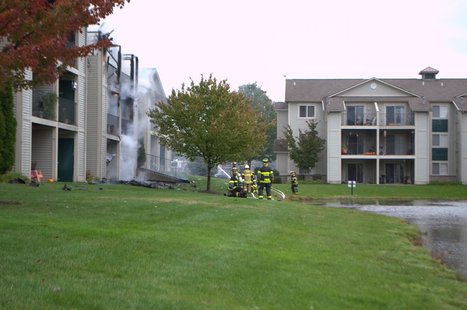 Firefighters battle the blaze. Photo Credit: Joel Oswald Firefighters battle the blaze. Photo Credit: Joel Oswald