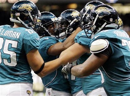 Jacksonville Jaguars wide receiver Kevin Elliott (87) celebrates with his team after scoring a touchdown late in the fourth quarter against Jacksonville Jaguars wide receiver Kevin Elliott (87) celebrates with his team after scoring a touchdown late in the fourth quarter against