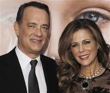 Cast member Tom Hanks (L) and his wife Rita Wilson arrive for the premiere of the film "Extremely Loud and Incredibly Close" in New York, De Cast member Tom Hanks (L) and his wife Rita Wilson arrive for the premiere of the film "Extremely Loud and Incredibly Close" in New York, De
