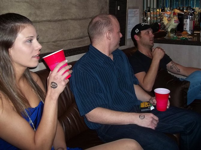 Y100 contest winners on the bus with Justin Moore