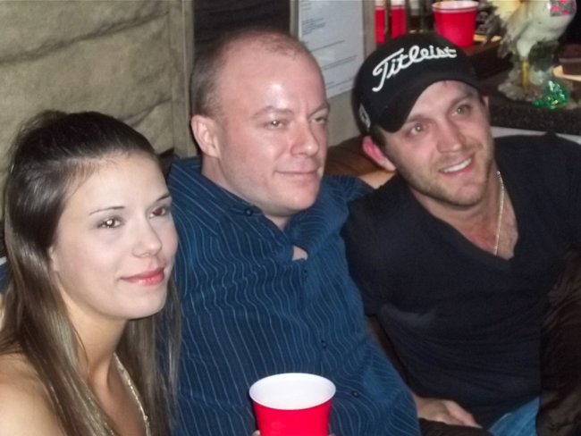 Y100 contest winners on the bus with Justin Moore