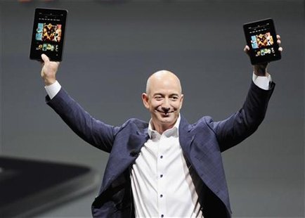 Amazon CEO Jeff Bezos holds up the new Kindle Fire HD 7" and Kindle Fire HD 8.9" (L) during Amazon's Kindle Fire event in Santa Monica, Cali Amazon CEO Jeff Bezos holds up the new Kindle Fire HD 7" and Kindle Fire HD 8.9" (L) during Amazon's Kindle Fire event in Santa Monica, Cali
