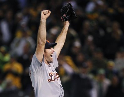 Detroit Tigers pitcher Justin Verlander celebrates after they defeated the Oakland Athletics during the ninth inning of Game 5 in their MLB Detroit Tigers pitcher Justin Verlander celebrates after they defeated the Oakland Athletics during the ninth inning of Game 5 in their MLB