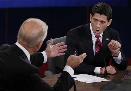 Vice President Joe Biden (L) and Republican vice presidential nominee Paul Ryan discuss a point during the vice presidential debate in Danvi Vice President Joe Biden (L) and Republican vice presidential nominee Paul Ryan discuss a point during the vice presidential debate in Danvi