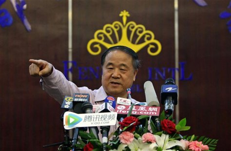 Chinese writer Mo Yan gestures during a news conference in his hometown of Gaomi, Shandong province October 12, 2012. Chinese Nobel Literatu Chinese writer Mo Yan gestures during a news conference in his hometown of Gaomi, Shandong province October 12, 2012. Chinese Nobel Literatu
