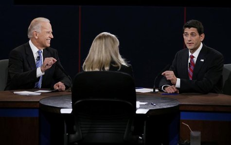 U.S. Vice President Joe Biden (L) and Republican vice presidential nominee Paul Ryan (R) debate in front of moderator Martha Raddatz (C) dur U.S. Vice President Joe Biden (L) and Republican vice presidential nominee Paul Ryan (R) debate in front of moderator Martha Raddatz (C) dur