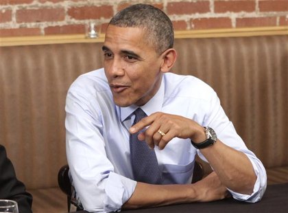 U.S. President Barack Obama speaks at a dinner with winners of a campaign contest at the Smith Commons restaurant in Washington October 12, U.S. President Barack Obama speaks at a dinner with winners of a campaign contest at the Smith Commons restaurant in Washington October 12,