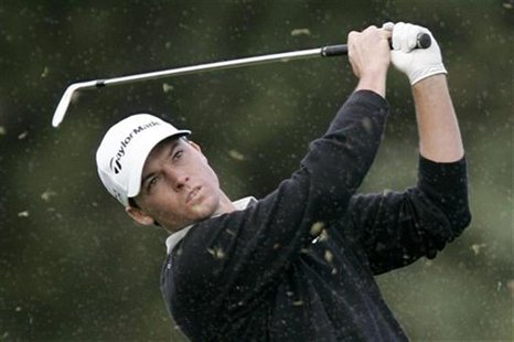 John Mallinger of the U.S. hits his approach shot at the first hole during the final round of the Pebble Beach National Pro-Am golf tourname John Mallinger of the U.S. hits his approach shot at the first hole during the final round of the Pebble Beach National Pro-Am golf tourname