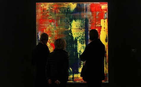 Visitors look at Gerhard Richter's "Abstraktes Bild (809-4) from 1994 which has an estimated value of £9 to £12 million (US$14.1-$18.8 milli Visitors look at Gerhard Richter's "Abstraktes Bild (809-4) from 1994 which has an estimated value of £9 to £12 million (US$14.1-$18.8 milli