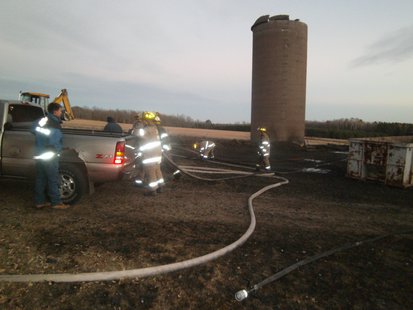 Firefighters cleaning up after a barn burned 10/12/12 northeast of Wausau on Paradise Lane. Firefighters cleaning up after a barn burned 10/12/12 northeast of Wausau on Paradise Lane.