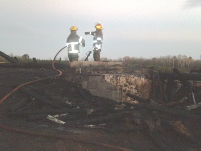 The foundation is all that's left of a barn that burned 10/12/12 on Paradise Lane northeast of Wausau The foundation is all that's left of a barn that burned 10/12/12 on Paradise Lane northeast of Wausau