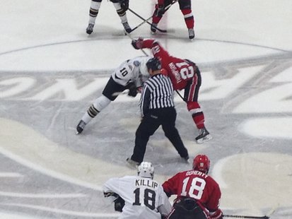Western Michigan center Josh Pitt takes the face off against St. Lawrence University Friday 10/12/2012 at Lawson Arena