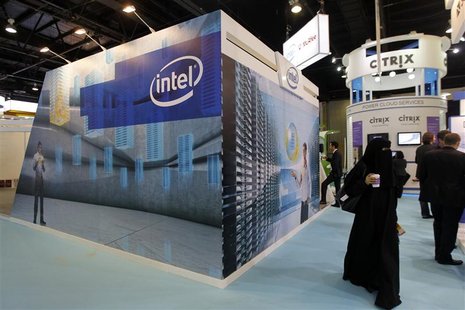 People walk past the Intel stand on the first day of the Gulf Information and Technology Exhibition (GITEX) at the Dubai World Trade Centre People walk past the Intel stand on the first day of the Gulf Information and Technology Exhibition (GITEX) at the Dubai World Trade Centre