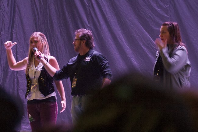 Abby, Mike Dubord, and Charli on stage
