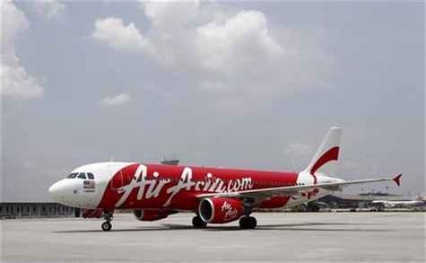 An Air Asia Airbus A320-200 aircraft approaches its parking space at the Low Cost Carrier Terminal (LCCT) in Sepang, outside Kuala Lumpur Ma An Air Asia Airbus A320-200 aircraft approaches its parking space at the Low Cost Carrier Terminal (LCCT) in Sepang, outside Kuala Lumpur Ma