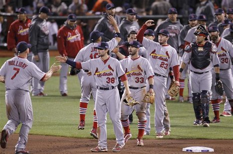 The St. Louis Cardinals celebrate after defeating the San Francisco Giants in Game 1 of their MLB NLCS playoff baseball series in San Franci The St. Louis Cardinals celebrate after defeating the San Francisco Giants in Game 1 of their MLB NLCS playoff baseball series in San Franci