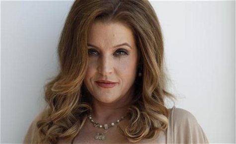 Music recording artist Lisa Marie Presley poses for a portrait in West Hollywood, California May 10, 2012. REUTERS/Mario Anzuoni Music recording artist Lisa Marie Presley poses for a portrait in West Hollywood, California May 10, 2012. REUTERS/Mario Anzuoni