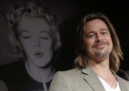 Cast member Brad Pitt attends a news conference for the film "Killing Them Softly", in competition at the 65th Cannes Film Festival May 22, Cast member Brad Pitt attends a news conference for the film "Killing Them Softly", in competition at the 65th Cannes Film Festival May 22,