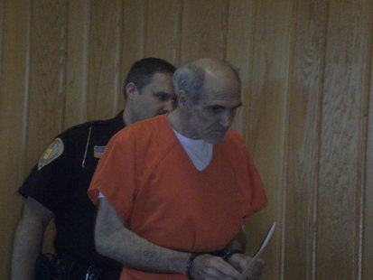 Charles T. Jost escorted out of court after a competency hearing 10/15/12
Charles T. Jost escorted out of court after a competency hearing 10/15/12