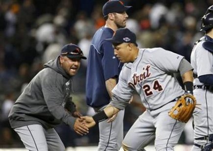 PUT 'ER THERE! Detroit Tigers catcher Gerald Laird (L) celebrates with third baseman Miguel Cabrera as pitcher Justin Verlander (C) walks past them after the Tigers defeated the New York Yankees in Game 2 of their American League Championship Series at Yankee Stadium on Oct. 14, 2012. REUTERS/Mike Segar PUT 'ER THERE! Detroit Tigers catcher Gerald Laird (L) celebrates with third baseman Miguel Cabrera as pitcher Justin Verlander (C) walks past them after the Tigers defeated the New York Yankees in Game 2 of their American League Championship Series at Yankee Stadium on Oct. 14, 2012. REUTERS/Mike Segar