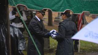 An honor guard folds the flag in honor of Lt. James A. Des Jardins. Des Jardins was buried on Sunday, October 14, 2012. His plane was shot down over Germany in 1944. (courtesy of FOX 11). An honor guard folds the flag in honor of Lt. James A. Des Jardins. Des Jardins was buried on Sunday, October 14, 2012. His plane was shot down over Germany in 1944. (courtesy of FOX 11).