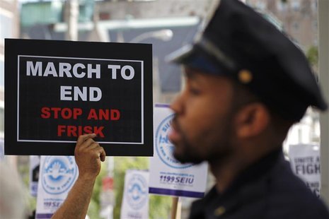 Demonstrators march during a protest in New York June 17, 2012. REUTERS/Eduardo Munoz Demonstrators march during a protest in New York June 17, 2012. REUTERS/Eduardo Munoz